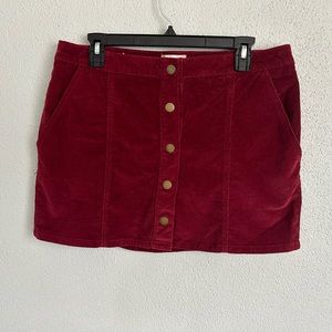 Altar’d State Burgundy Corduroy Skirt. With gold detailing.
